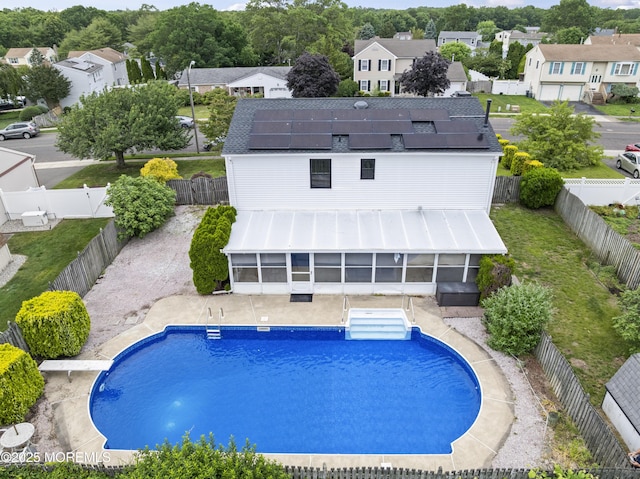 190 Ravenwood Blvd, Barnegat, NJ 08005 - view of pool with a sunroom, a residential view, a fenced backyard, and a patio area