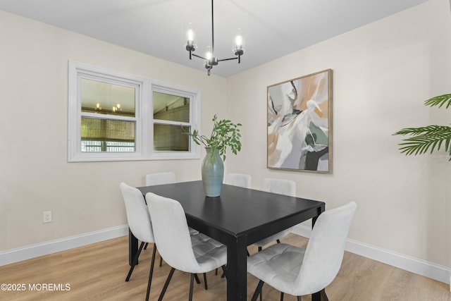 190 Ravenwood Blvd, Barnegat, NJ 08005 - dining room featuring a chandelier, light wood-style flooring, and baseboards