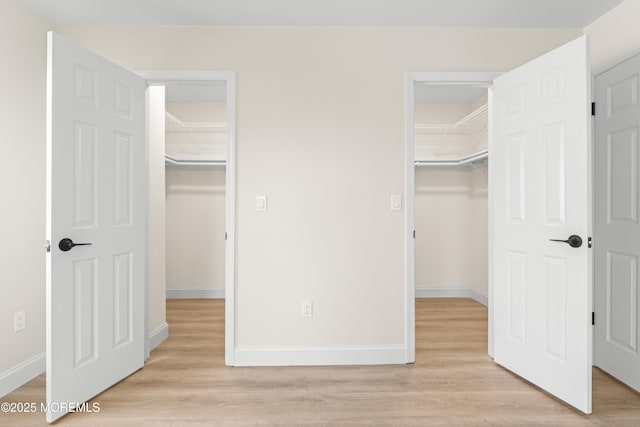 190 Ravenwood Blvd, Barnegat, NJ 08005 - unfurnished bedroom with a spacious closet, a closet, and light wood-type flooring