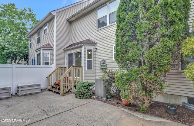 28 Tulip Ct, Howell, NJ 07731 - back of house featuring a patio area and central AC unit