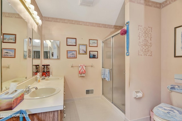 28 Tulip Ct, Howell, NJ 07731 - bathroom with a stall shower, double vanity, baseboards, and tile patterned floors