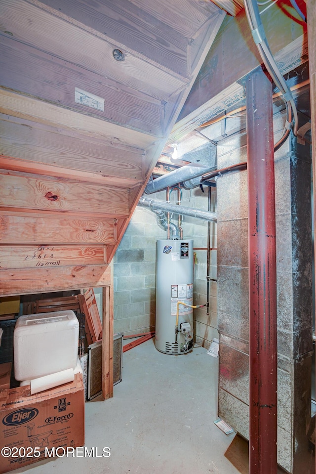 28 Tulip Ct, Howell, NJ 07731 - unfinished basement featuring water heater and concrete block wall