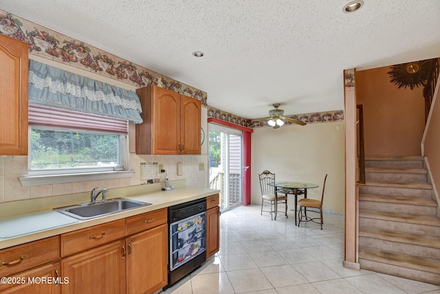 28 Tulip Ct, Howell, NJ 07731 - kitchen with a sink, a textured ceiling, a ceiling fan, light countertops, and dishwasher