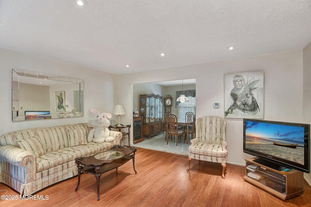 28 Tulip Ct, Howell, NJ 07731 - living area with wood finished floors and recessed lighting