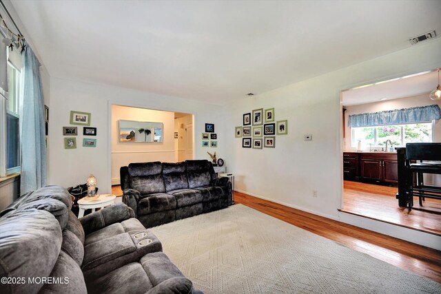 855 Derry Dr, Toms River, NJ 08753 - living room with wood finished floors and baseboards