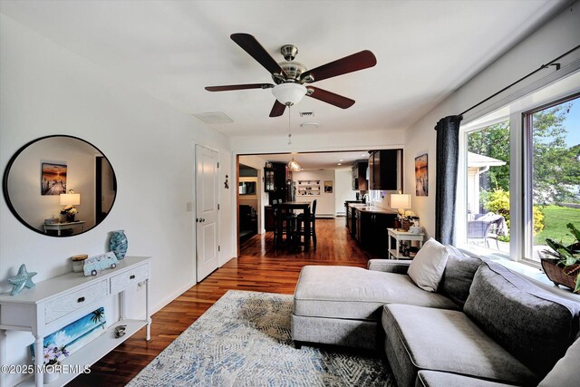 855 Derry Dr, Toms River, NJ 08753 - living area with ceiling fan and dark wood-style floors