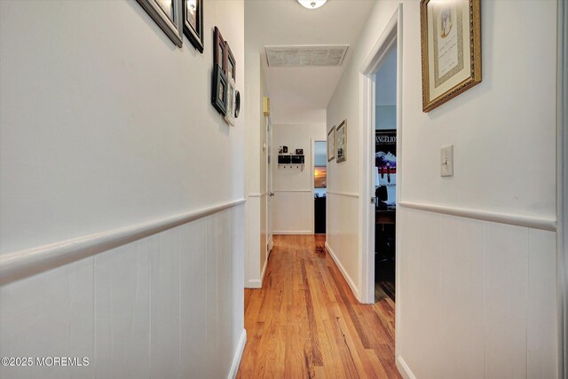 855 Derry Dr, Toms River, NJ 08753 - hallway featuring light wood-style flooring and a wainscoted wall