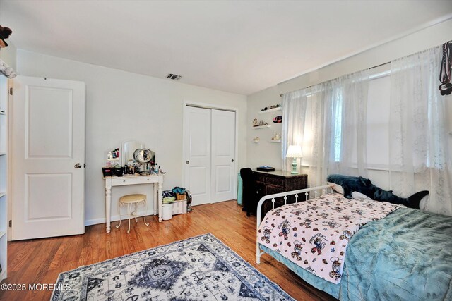 855 Derry Dr, Toms River, NJ 08753 - bedroom with wood finished floors and a closet