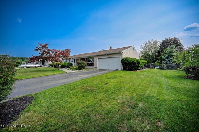 855 Derry Dr, Toms River, NJ 08753 - ranch-style home with asphalt driveway, a garage, and a chimney