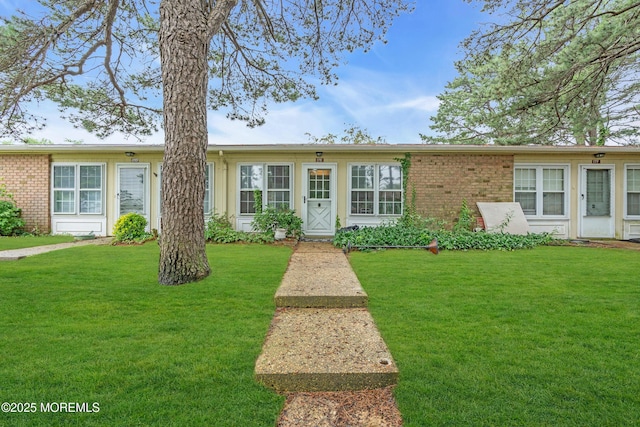 17E Cambridge Cir, Manchester, NJ 08759 - single story home with brick siding and a front lawn