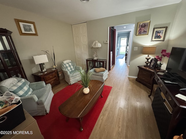 17E Cambridge Cir, Manchester, NJ 08759 - living room with wood finished floors and baseboards