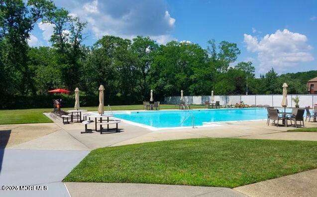 1 Magnolia Ln Unit B, Eatontown, NJ 07724 - community pool featuring a patio