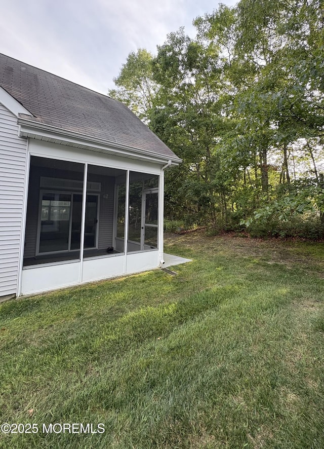 48 Marigold Ln, Little Egg Harbor, NJ 08087 - view of grassy yard with a sunroom