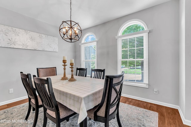 6 Hoffer Ct, Marlboro, NJ 07746 - dining area featuring plenty of natural light, a chandelier, and wood finished floors