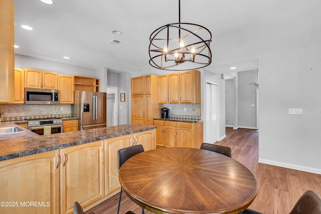 6 Hoffer Ct, Marlboro, NJ 07746 - kitchen with appliances with stainless steel finishes, backsplash, light brown cabinets, recessed lighting, and dark countertops