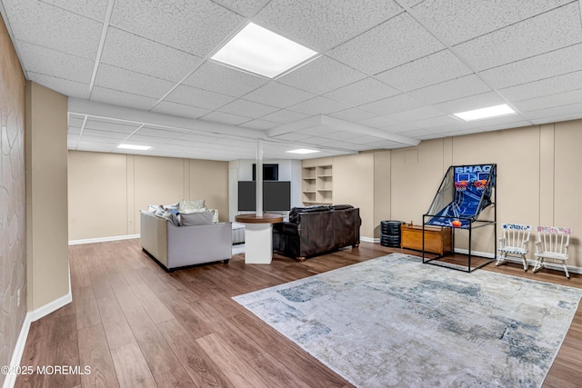 6 Hoffer Ct, Marlboro, NJ 07746 - living area with a drop ceiling and wood finished floors