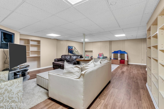6 Hoffer Ct, Marlboro, NJ 07746 - living room featuring a drop ceiling and wood finished floors