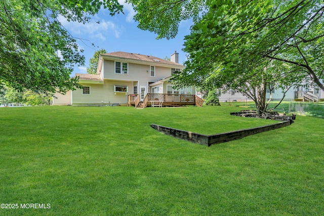 6 Hoffer Ct, Marlboro, NJ 07746 - rear view of property with a deck and a lawn