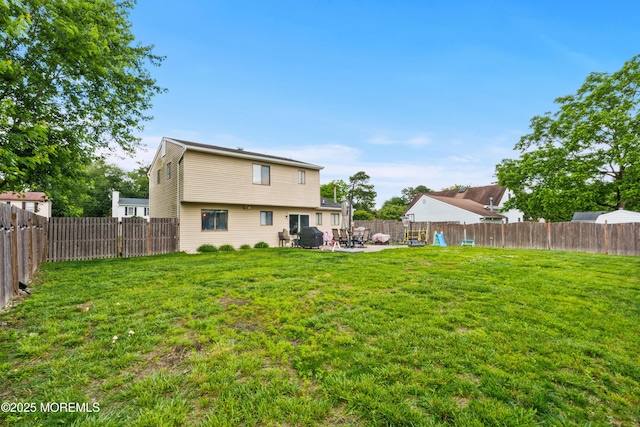 3 Mendon Dr, Howell, NJ 07731 - rear view of property with a patio and a fenced backyard