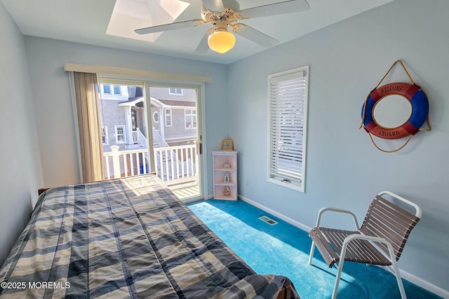 443 Harding Ave, Ortley Beach, NJ 08751 - carpeted bedroom featuring access to exterior, a skylight, and ceiling fan
