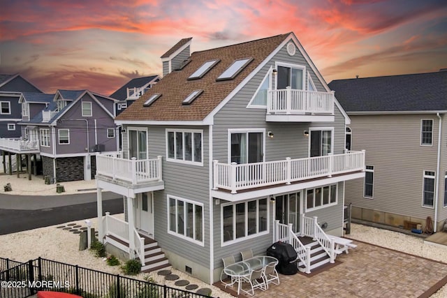 443 Harding Ave, Ortley Beach, NJ 08751 - back of property with a balcony, a patio, and crawl space