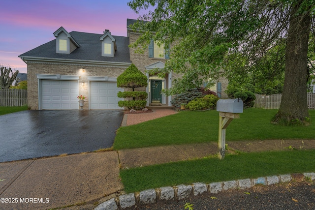 308 Clare Ct, Morganville, NJ 07751 - view of front of property with driveway, an attached garage, brick siding, and roof with shingles