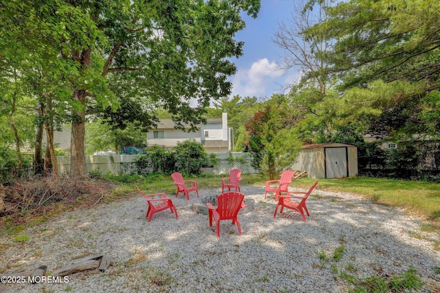 73 Barnegat Blvd S, Barnegat, NJ 08005 - view of yard with a storage unit and a fire pit