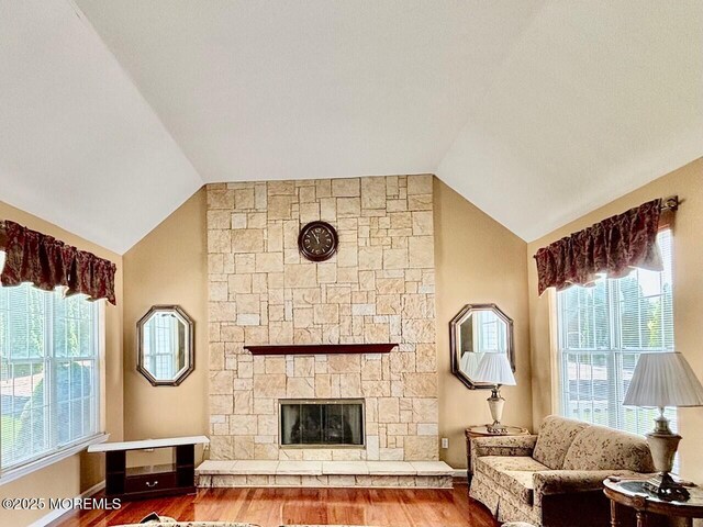 15 Hannah Lee Rd, Barnegat, NJ 08005 - living room featuring lofted ceiling, wood finished floors, and a fireplace
