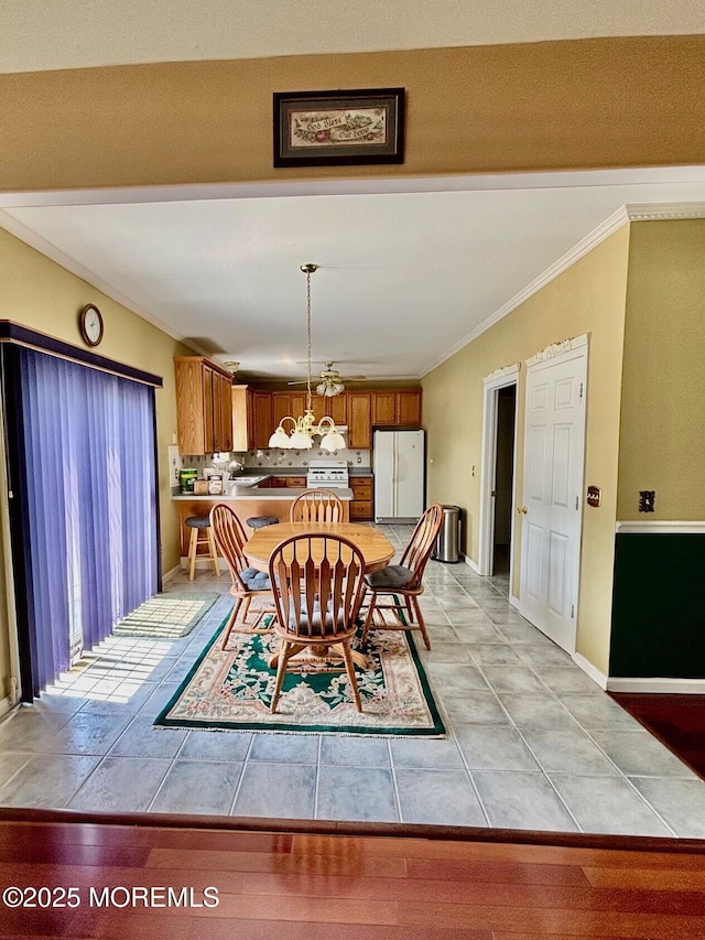 15 Hannah Lee Rd, Barnegat, NJ 08005 - dining room featuring ornamental molding, light tile patterned floors, and a chandelier