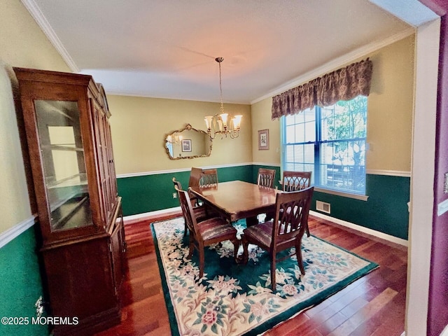 15 Hannah Lee Rd, Barnegat, NJ 08005 - dining room with wood finished floors, crown molding, and a chandelier