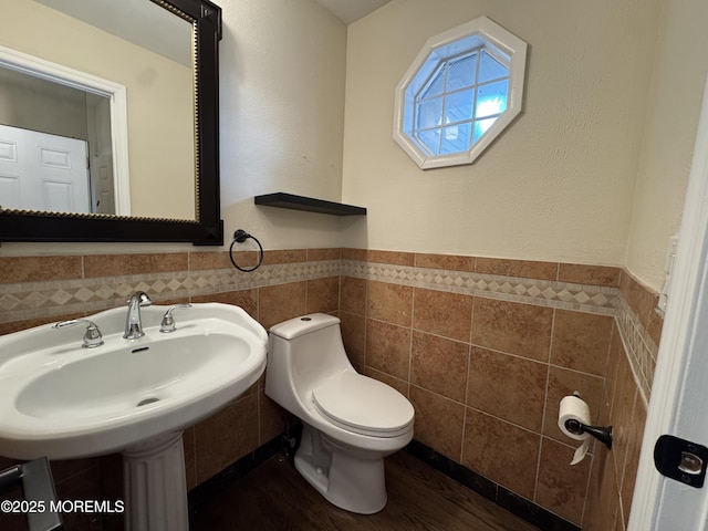 3 Churchill Downs, West Long Branch, NJ 07764 - bathroom with tile walls, wainscoting, and wood finished floors