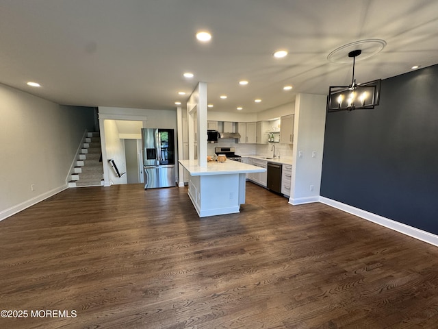 3 Churchill Downs, West Long Branch, NJ 07764 - kitchen with stainless steel appliances, light countertops, recessed lighting, a chandelier, and dark wood-style flooring