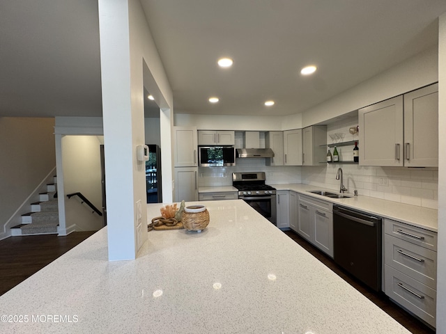 3 Churchill Downs, West Long Branch, NJ 07764 - kitchen featuring stainless steel appliances, wall chimney range hood, gray cabinetry, open shelves, and backsplash