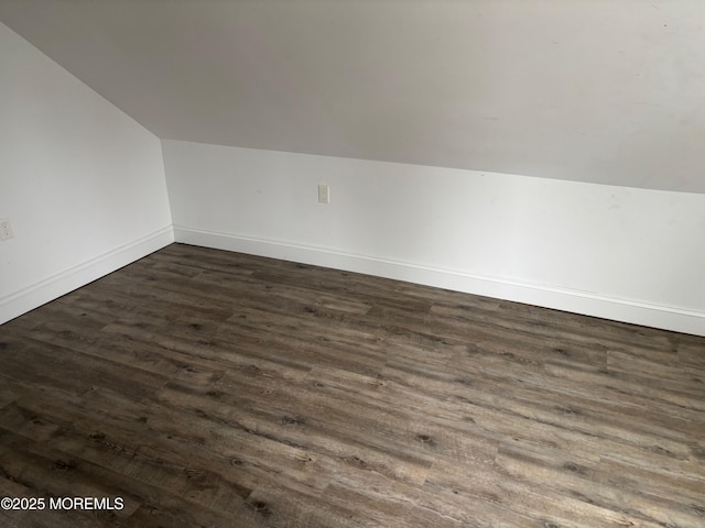 530 E Point Pleasant Ave, Ocean Gate, NJ 08740 - additional living space with vaulted ceiling and dark wood-style floors