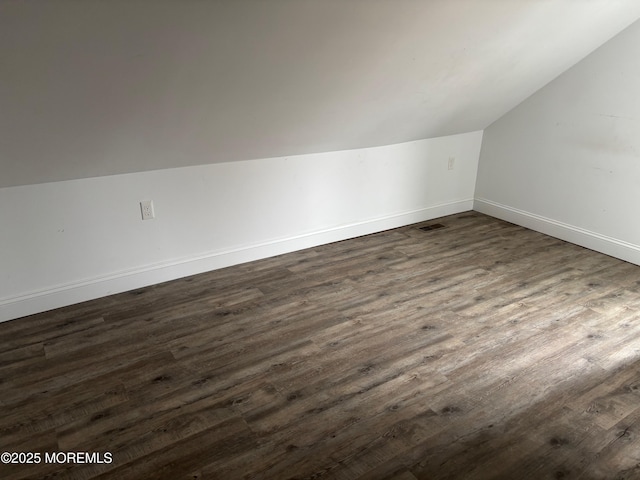 530 E Point Pleasant Ave, Ocean Gate, NJ 08740 - bonus room featuring vaulted ceiling and dark wood-style flooring