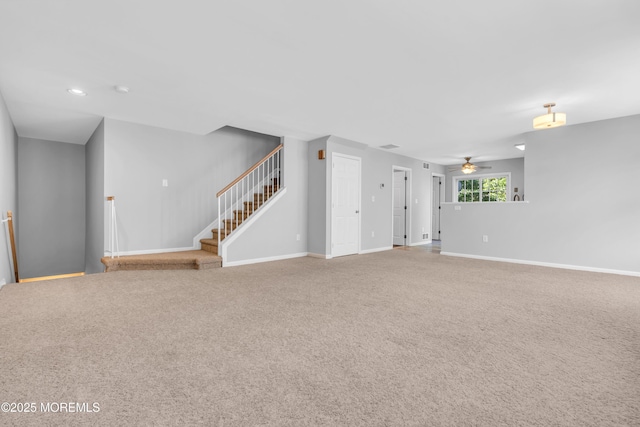2211 Timber Ridge Ct Unit 2211, Sayreville, NJ 08859 - unfurnished living room featuring a ceiling fan, carpet, and stairway