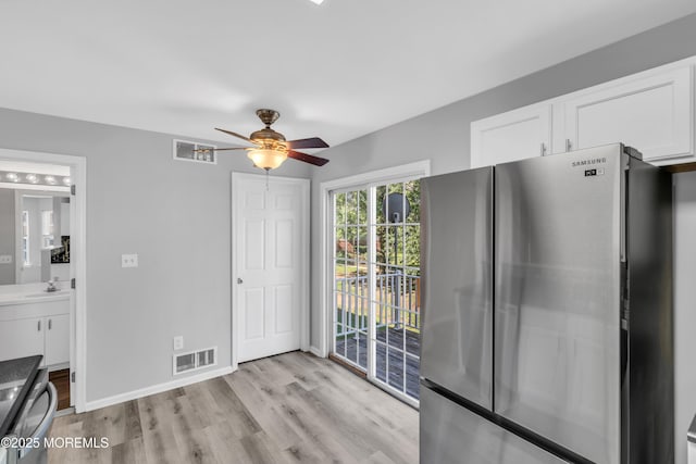 2211 Timber Ridge Ct Unit 2211, Sayreville, NJ 08859 - unfurnished dining area with light wood-style flooring and a ceiling fan