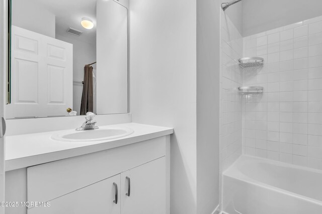 2211 Timber Ridge Ct Unit 2211, Sayreville, NJ 08859 - bathroom featuring vanity and shower / bathtub combination with curtain