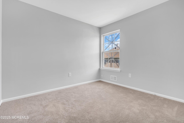 2211 Timber Ridge Ct Unit 2211, Sayreville, NJ 08859 - carpeted empty room with baseboards
