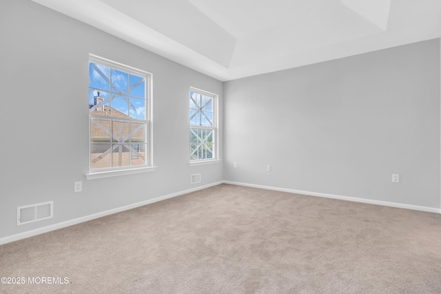 2211 Timber Ridge Ct Unit 2211, Sayreville, NJ 08859 - carpeted empty room with a raised ceiling and baseboards