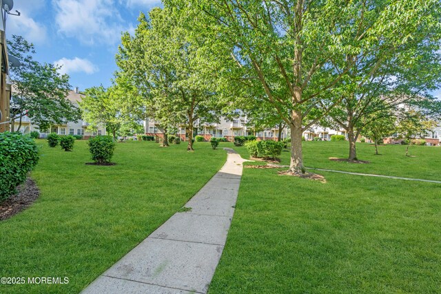 2211 Timber Ridge Ct Unit 2211, Sayreville, NJ 08859 - view of community featuring a lawn and a residential view