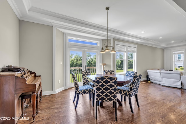 1605 Lakewood Rd, Manasquan, NJ 08736 - dining space with a tray ceiling, wood finished floors, ornamental molding, recessed lighting, and a chandelier