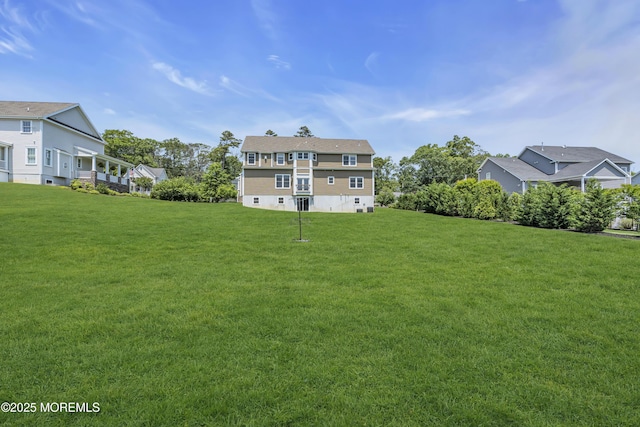 1605 Lakewood Rd, Manasquan, NJ 08736 - back of house featuring a lawn