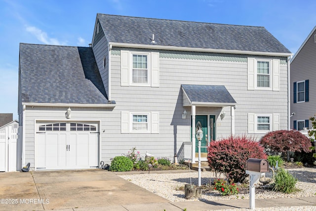 91 Wind Jammer Ct, Bayville, NJ 08721 - traditional-style house featuring an attached garage, driveway, and roof with shingles