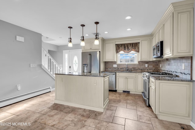91 Wind Jammer Ct, Bayville, NJ 08721 - kitchen featuring cream cabinets, stainless steel appliances, dark stone counters, healthy amount of natural light, and recessed lighting