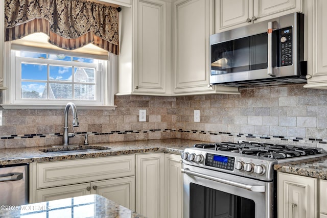 91 Wind Jammer Ct, Bayville, NJ 08721 - kitchen with appliances with stainless steel finishes, backsplash, and light stone counters