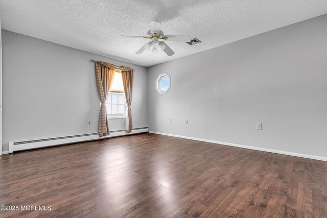 91 Wind Jammer Ct, Bayville, NJ 08721 - empty room featuring a baseboard heating unit, a ceiling fan, a textured ceiling, and wood finished floors