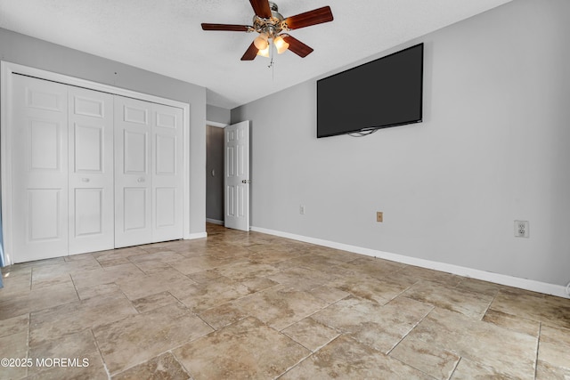 91 Wind Jammer Ct, Bayville, NJ 08721 - unfurnished bedroom with stone finish floors, a closet, and ceiling fan