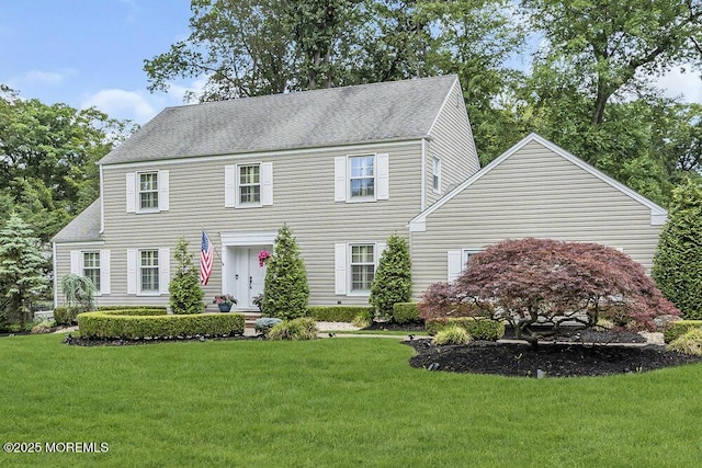 32 Blackbriar Dr, Colts Neck, NJ 07722 - colonial inspired home with a front lawn and roof with shingles