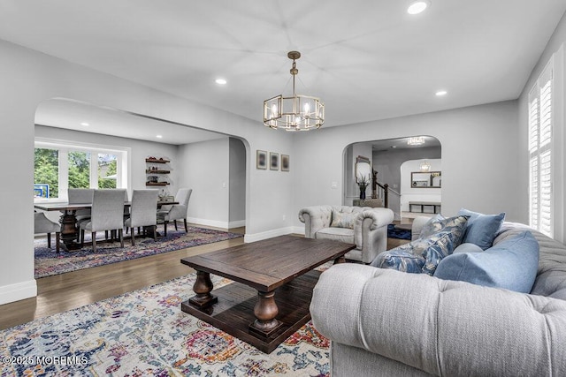 32 Blackbriar Dr, Colts Neck, NJ 07722 - living room featuring arched walkways, plenty of natural light, wood finished floors, and recessed lighting
